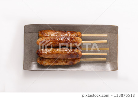 Beef tongue meatball skewers (with sauce) 133876518