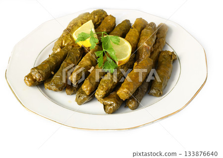 Stuffed collard greens with boiled leaves, traditonal turkish black sea region food, sarma, dolma Stuffed collard greens with boiled leaves, traditonal turkish black sea region food, sarma, dolma 133876640