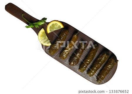 Stuffed collard greens with boiled leaves, traditonal turkish black sea region food, sarma, dolma Stuffed collard greens with boiled leaves, traditonal turkish black sea region food, sarma, dolma 133876652