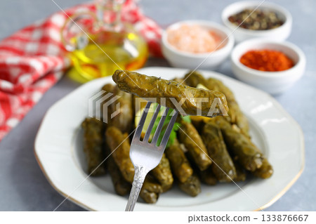 Stuffed collard greens with boiled leaves, traditonal turkish black sea region food, sarma, dolma 133876667