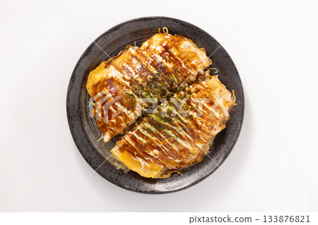 Hiroshima-style okonomiyaki with cheese Hiroshima-style okonomiyaki with cheese 133876821