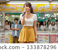 Bright stage scene with women in summer clothes singing at outdoor event 133878296