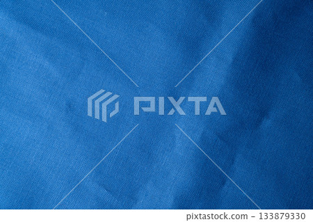 Wrinkled and textured blue fabric texture background Wrinkled and textured blue fabric texture background 133879330