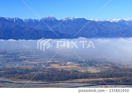 Azumino in the morning mist and the Northern Alps in early winter Azumino in the morning mist and the Northern Alps in early winter 133881930