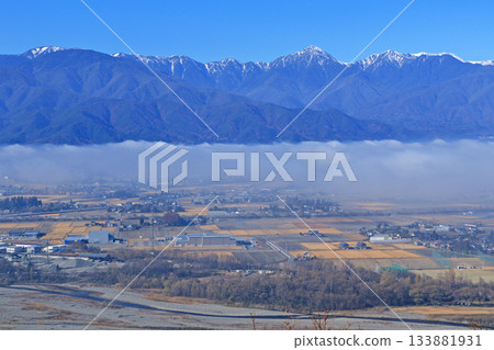 Azumino in the morning mist and the Northern Alps in early winter 133881931
