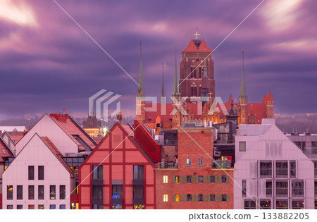 St Marys Church behind modern rooftops in Gdansk Poland 133882205