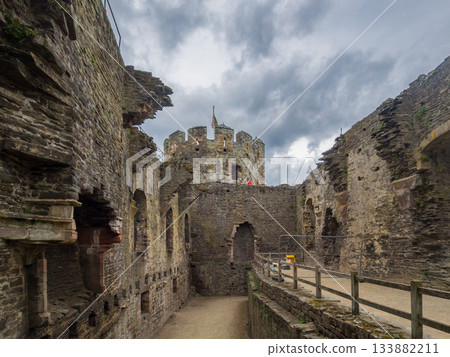The remains of a medieval castle's great hall and ramparts (Conwy, Wales, UK) 133882211