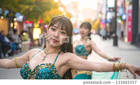 An image of a belly dancer full of charm and smiles, 16:9 size 133883357