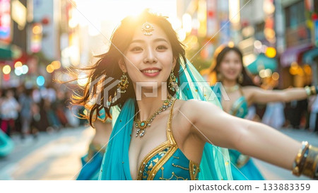 An image of a belly dancer full of charm and smiles, 16:9 size 133883359