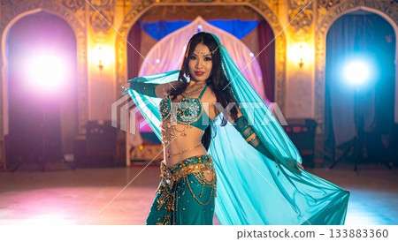 An image of a belly dancer full of charm and smiles, 16:9 size 133883360