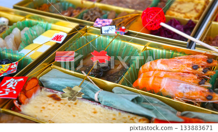 A tiered box of osechi dishes and a luxurious New Year's assortment A tiered box of osechi dishes and a luxurious New Year's assortment 133883671