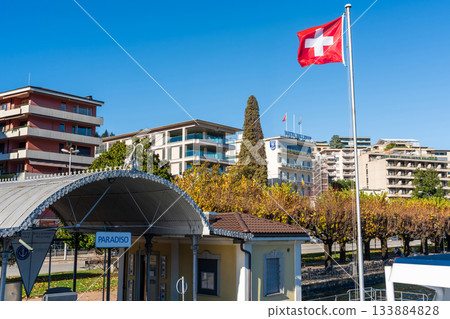 Paradiso boat dock and Swiss flag, Lugano, Ticino, Switzerland 133884828