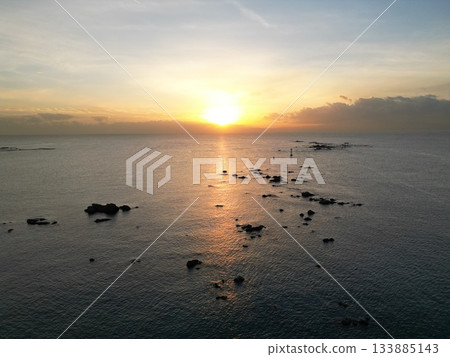 Sunset over the winter sea 133885143