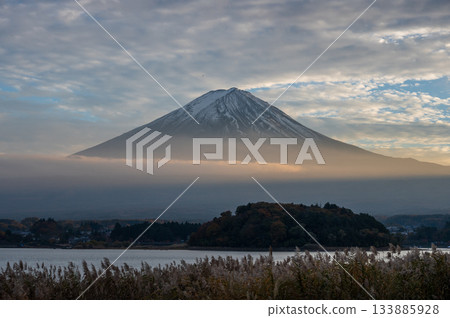 Fuji at dusk, orange clouds passing by 133885928