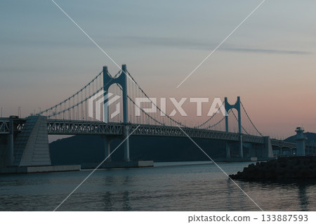 Majestic and Beautiful Night View of Gwangandaegyo Bridge in Busan, Korea, with Blue Hues at Dusk 133887593