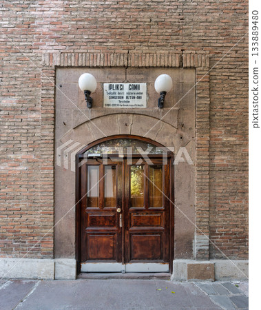 Historic Iplikci Mosque Side Entrance with Traditional Wooden Door and Brick Wall, Konya, Turkey Historic Iplikci Mosque Side Entrance with Traditional Wooden Door and Brick Wall, Konya, Turkey 133889480
