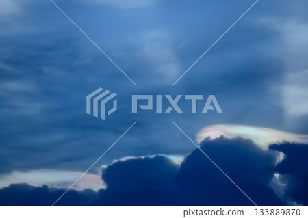 The cloud has rainbow colors. 133889870