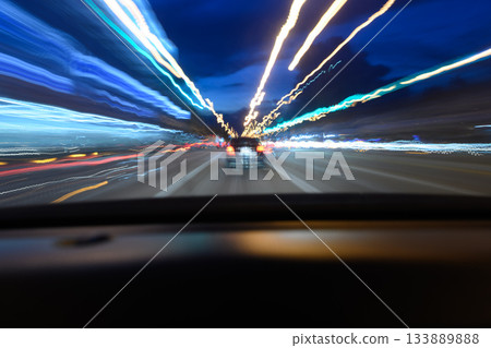 Road view while driving, shot from inside the car. Road view while driving, shot from inside the car. 133889888