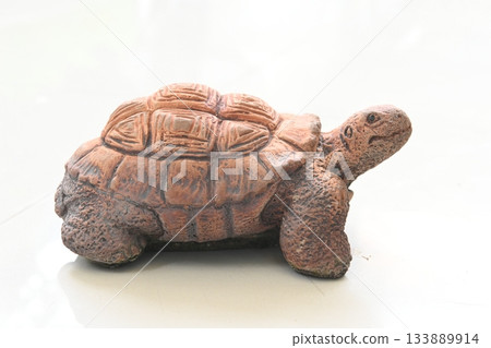 A turtle sculpture made from plaster A turtle sculpture made from plaster 133889914