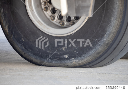 Close-up of landing gear tire and wheel hub Close-up of landing gear tire and wheel hub 133890448