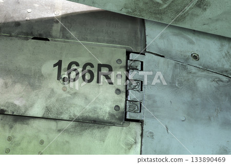 Metallic aircraft hinge with panel code marking 133890469