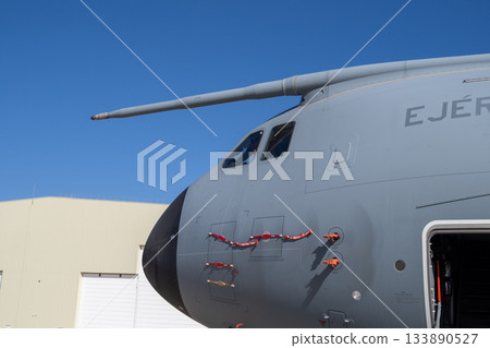 Cockpit section of military airlifter with refueling probe and access door 133890527