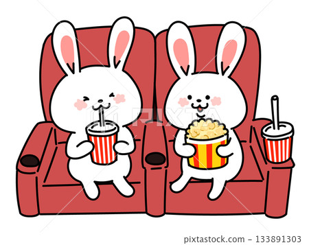 兩隻友善的兔子一邊吃爆米花一邊喝飲料，一起看電影的插圖。 133891303