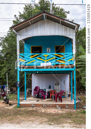Colorful natural-framed houses with balconies at Pesqueiro, Soure in Marajo Island, Brazil. Colorful natural-framed houses with balconies at Pesqueiro, Soure in Marajo Island, Brazil. 133891429