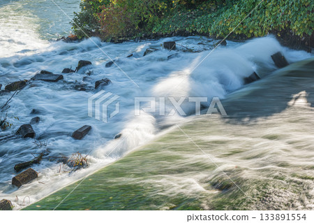Rapid currents flowing from Misu Arai Weir into the Uji River, Fushimi Ward, Kyoto City Rapid currents flowing from Misu Arai Weir into the Uji River, Fushimi Ward, Kyoto City 133891554
