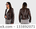 Woman Wearing Black Leather Jacket Front and Back View 133892071