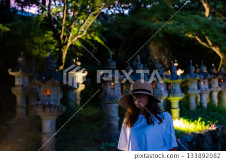 A woman wearing a Katsuoji hat A woman wearing a Katsuoji hat 133892082