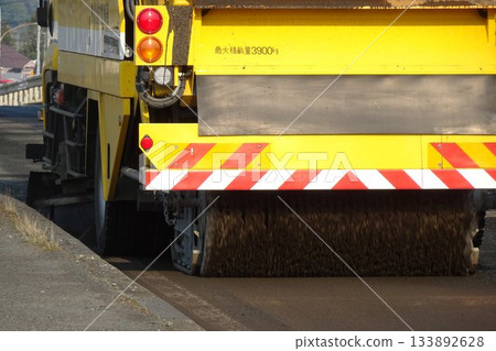 Working vehicle: Road sweeper cleaning the road Working vehicle: Road sweeper cleaning the road 133892628