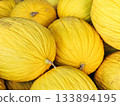 Yellow melons, lots of sweet fruit, nutritional value, vitamins, food, health 133894195