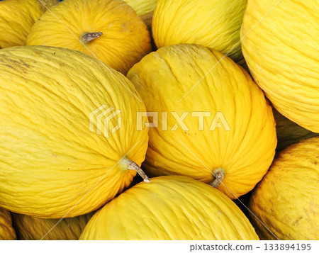 Yellow melons, lots of sweet fruit, nutritional value, vitamins, food, health Yellow melons, lots of sweet fruit, nutritional value, vitamins, food, health 133894195