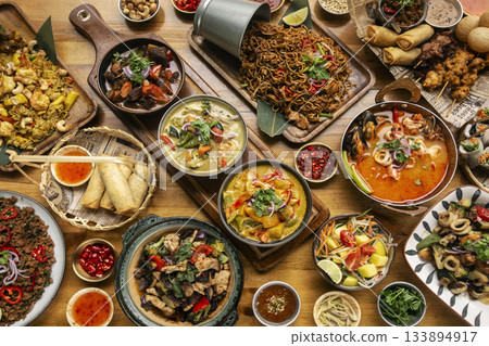 many different thai food dishes on table in modern restaurant in bangkok thailand many different thai food dishes on table in modern restaurant in bangkok thailand 133894917