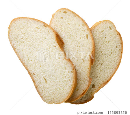 Pieces of bread cut out on a white. Top view Pieces of bread cut out on a white. Top view 133895856