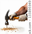 Close-up of Gloved Hands Holding Hammer on a Nail Head with Dynamic Debris and Dust Effect. 133895949