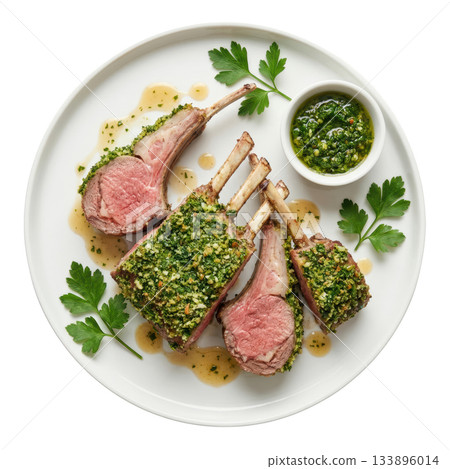 Gourmet roasted rack of lamb persillade, an appetizing main course with savory green herb crust and parsley garnish 133896014