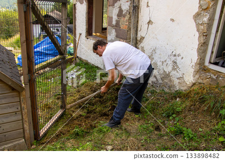 Digging in the mountain with a pickaxe 133898482