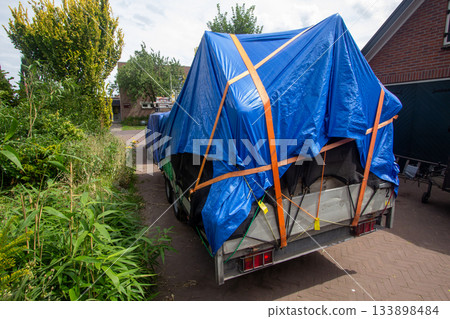 Car with trailer filled with stuff for emigration Car with trailer filled with stuff for emigration 133898484