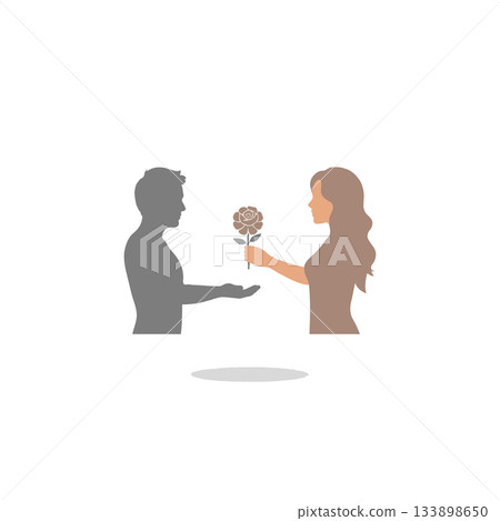 The gentle gesture of affection: a man offers a flower to a woman during a special moment of 133898650