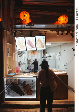 A mountain town shrouded in mist and light. A night in Jiufen Old Street, Taiwan, like something straight out of a movie 133899699