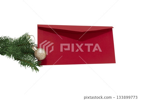 Red envelope with white card, pine branch, cone and twine, isolated on white background, festive and natural 133899773