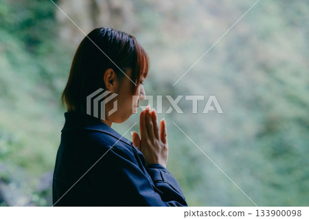 A scene of a young woman worshiping A scene of a young woman worshiping 133900098