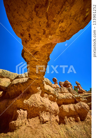 Red Canyon Utah Natural Rock Arch and Hoodoo Formations Against Clear Blue Sky 133901252