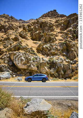 Subaru SUV On Roadside With Rocky Hillside And Blue Sky Sequoia National Forest Subaru SUV On Roadside With Rocky Hillside And Blue Sky Sequoia National Forest 133901262