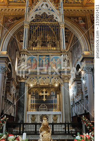 Archbasilica of Saint John Lateran interior Rome golden coffered ceiling marble columns statues ornate chapels baptistery and apse Catholic basilica Italy. High quality photo 133901411
