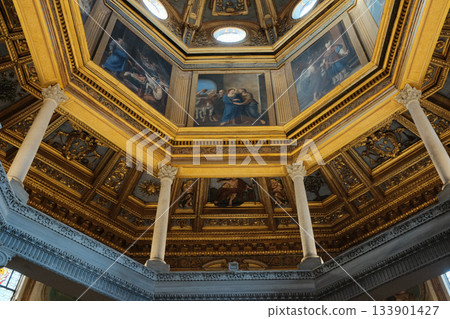 Archbasilica of Saint John Lateran interior Rome golden coffered ceiling marble columns statues ornate chapels baptistery and apse Catholic basilica Italy. High quality photo Archbasilica of Saint John Lateran interior Rome golden coffered ceiling marble columns statues ornate chapels baptistery and apse Catholic basilica Italy. High quality photo 133901427