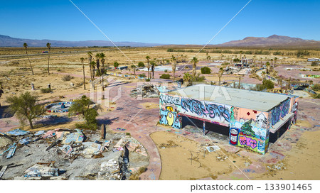 Aerial Abandoned Water Park Graffiti and Desert Landscape California 133901465