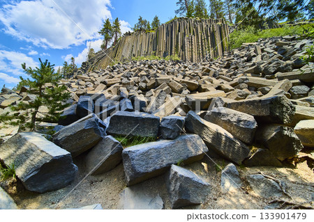 Basalt Columns and Boulder Field at Devils Postpile California in Bright Summer Light Basalt Columns and Boulder Field at Devils Postpile California in Bright Summer Light 133901479
